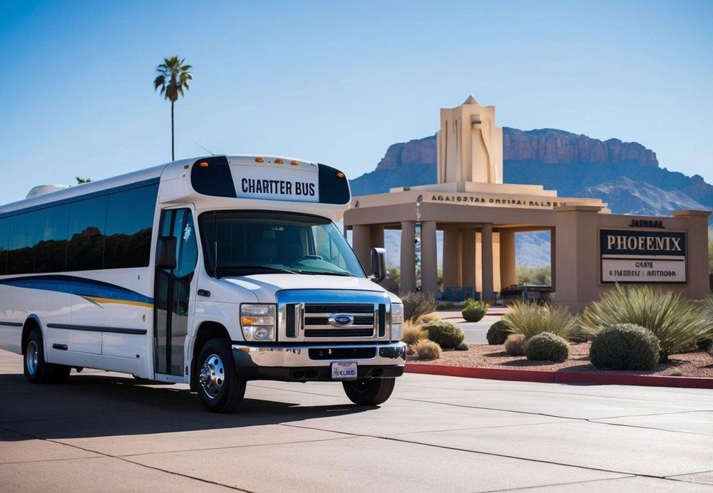 A charter bus parked outside a Phoenix, Arizona landmark with a clear blue sky and a mountain range in the background